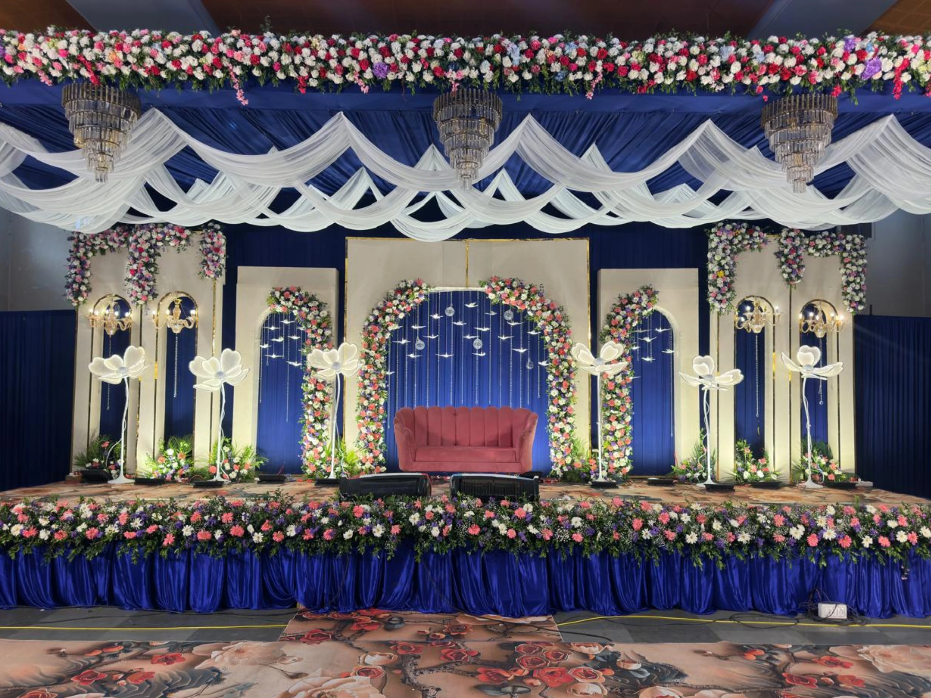 Elegant wedding stage decorated by Sri Garuda Decorators